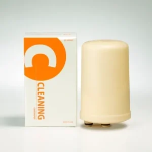 A white box next to a small cylinder.